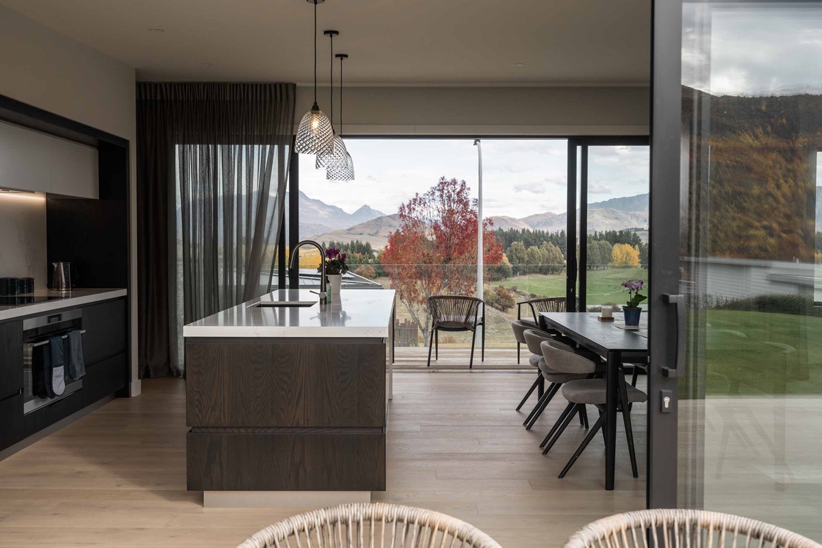 Captured here is one of Marie's favourite places within their home. The open plan kitchen looking out towards the stunning mountain views never ceases to amaze both Alister and Marie.